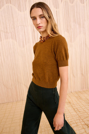 Close-up of Ulla Johnson Liv Embroidered Cashmere Short Sleeve Knit in Umber, highlighting the soft cashmere texture and intricate embellishments.