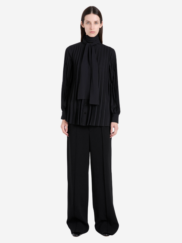 Soomin Top in Black by Proenza Schouler featuring elegant accordion pleats and button-front closures.