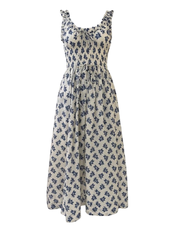 Emmaretta Dress in Creme Pomegranate Bloom by Dôen, featuring a scoop neckline, adjustable tie, gathered bust, wide straps with delicate ruffles, and a full ankle-grazing skirt, crafted from 100% organic cotton.