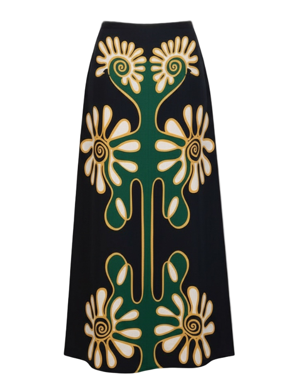 Luxury Celina Skirt in Namur featuring a high-waisted A-line silhouette, adorned with vibrant floral patterns in yellow and green, showcasing intricate designs on a dark background.