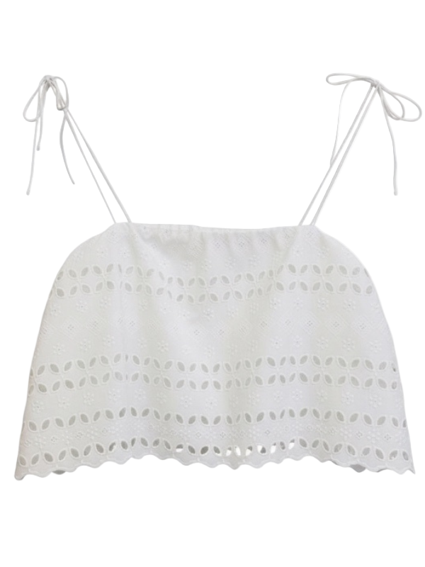Luxurious Abajo Top in Rosa Broderie White by FaithFull, featuring a delicate cropped design with eyelet fabric and spaghetti tie straps, perfect for elegant summer outings.