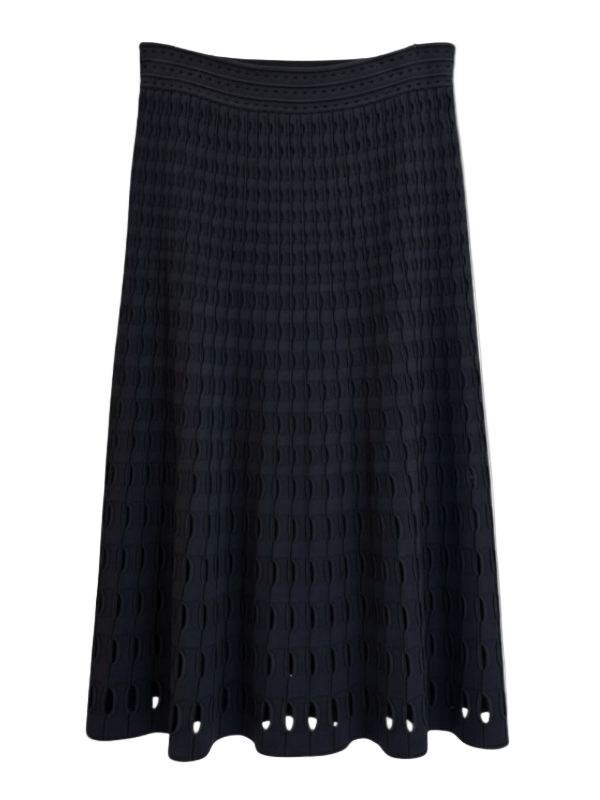 Elevate your wardrobe with the Drue Midi Skirt in Black by Simkhai, featuring a sophisticated openwork compact knit design, perfect for a luxurious and stylish look.