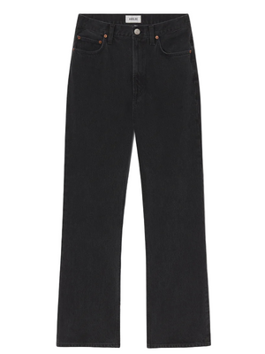 Agolde's Leena Jean in Forecast, a flattering high-rise flare with an elongated leg, crafted from organic and recycled denim in a washed-out black color with warm undertones. Perfect for styling with a crisp white tee or oversized blazer.