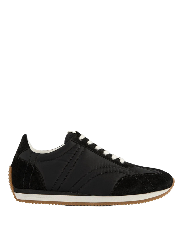 Sport Sneakers in Black by TOTEME featuring monogram-quilted polyamide and suede trims.