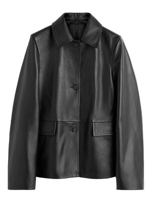 Front view of TOTEME's Grained Leather Jacket in Black showcasing its straight silhouette and heavy grained leather.