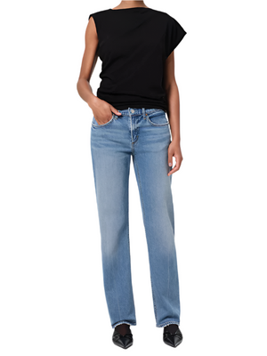 Agolde Low Rise Slim Stretch jeans in Kindle color showcasing the flattering close-to-the-body fit and medium indigo wash.