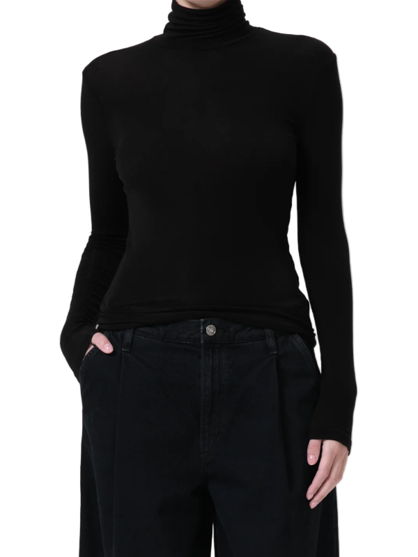 Agolde Pascale Turtleneck in Black, showcasing its streamlined silhouette and soft fit.