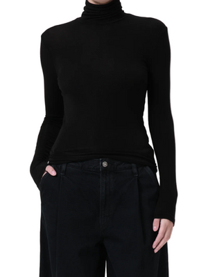 Agolde Pascale Turtleneck in Black, showcasing its streamlined silhouette and soft fit.