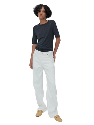 Everyday Jean in Milk by Still Here showcasing a relaxed fit and mid-rise design.