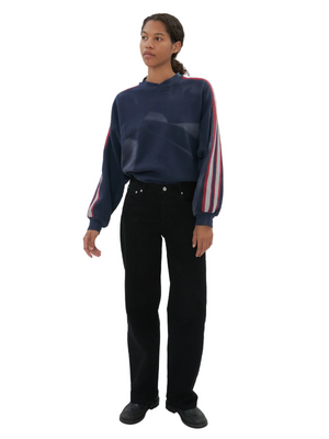 Everyday Jean in Black by Still Here, showcasing a relaxed fit and mid-rise design, perfect for everyday wear.