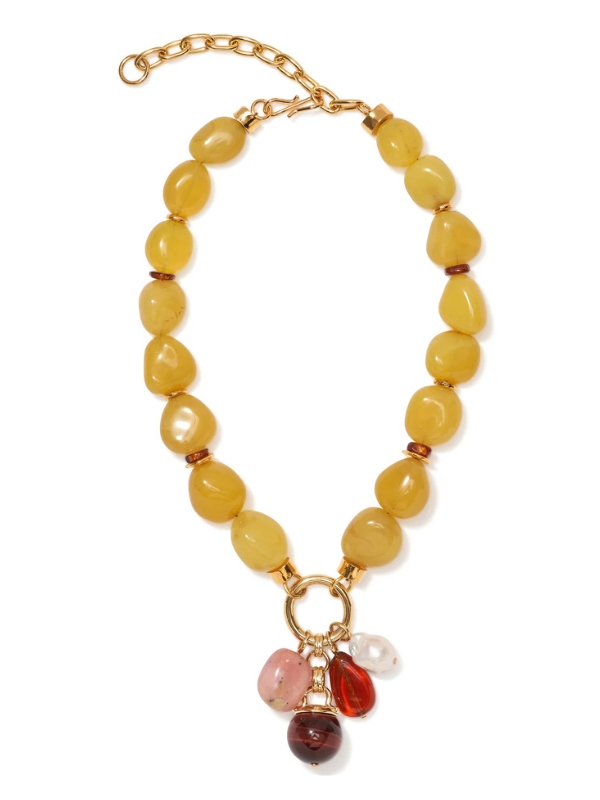 Cordoba Charm Necklace in Multi showcasing sunny yellow chalcedony and unique charms including pink opal, red tiger's eye, glass teardrop, and oversized freshwater pearl.