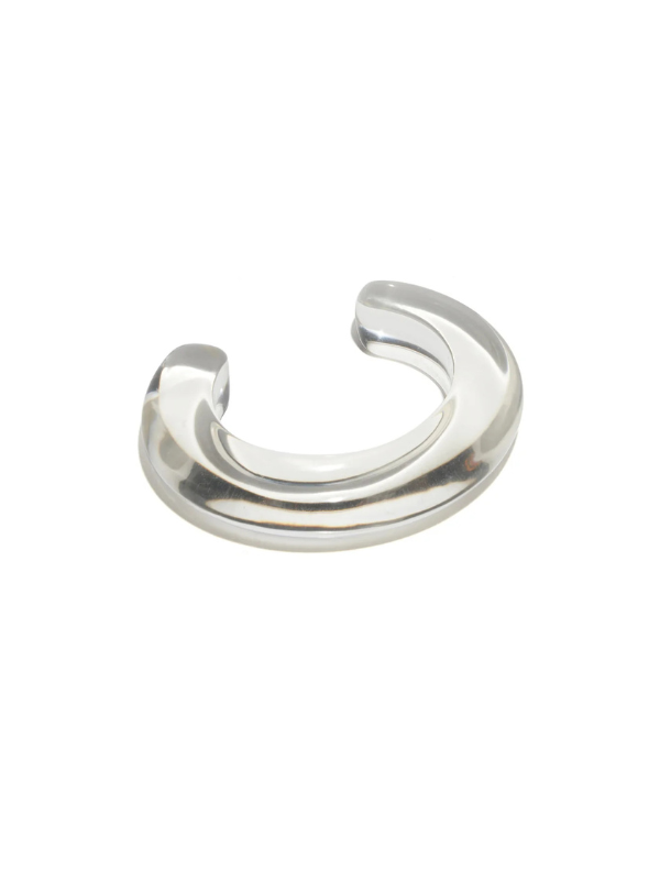 Ridge Cuff in Clear by Lizzie Fortunato, showcasing a sleek thin domed design in clear resin, perfect for wearing solo or stacking for a bold statement.