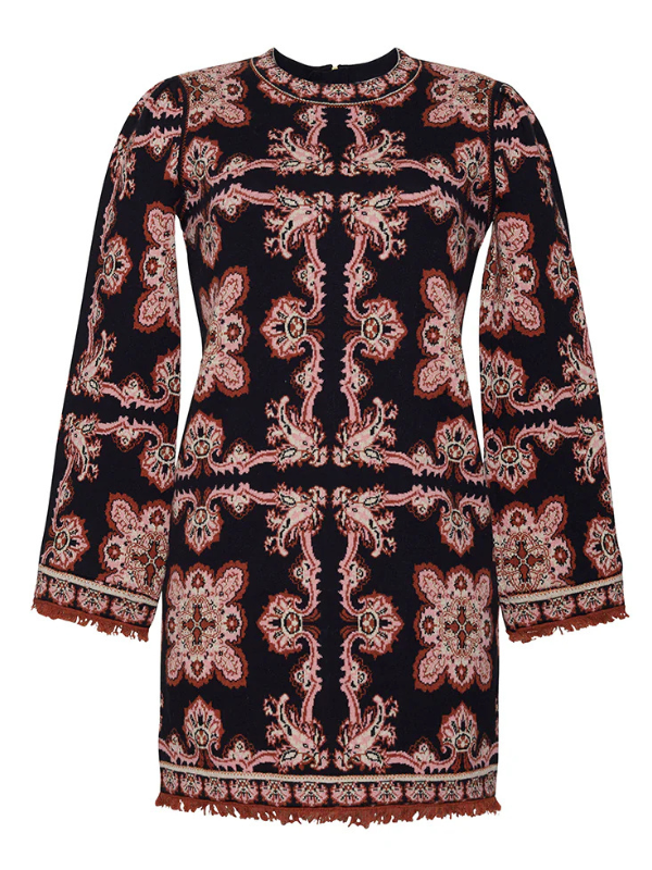 Fritz Dress in Black Paisley by Cara Cara, showcasing the festive novelty birdseye jacquard pattern and flared puff sleeves.