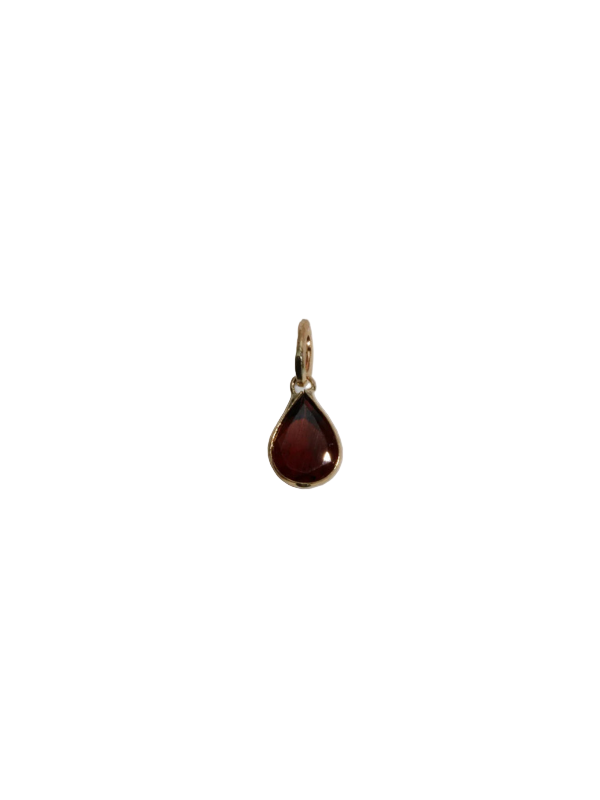 Scarlet Teardrop Charm in Garnet showcasing the pear-cut garnet stone encased in 14k yellow gold, symbolizing elegance.