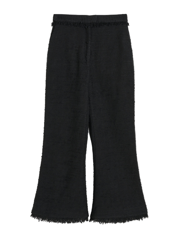 Mafaldana Boucle Trousers in Black displayed on a model showcasing the trendy cropped design and chic side pockets.