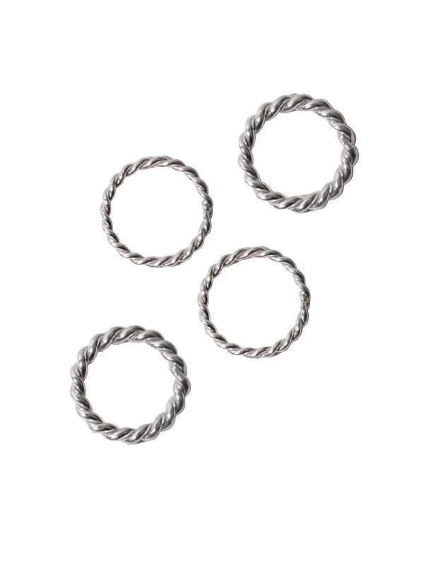 Spiral Rope Ring Set in Silver by Loren Stewart showcasing a hand-twisted design featuring both thin and thick rings for versatile styling.