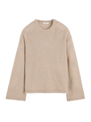 Cierra Sweater in Cobblestone by By Malene Birger, showcasing its beautiful braided hem and cozy knit texture.