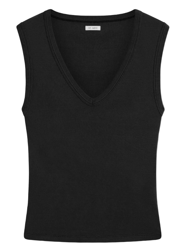 St. Agni Organic Cotton 90s Top in Black displayed on a model, showcasing its trendy V-neckline and form-fitting silhouette.