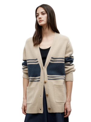 Varsity Phoebe Sweater in Twine showcasing its oversized v-neck design and bold contrast stripes.