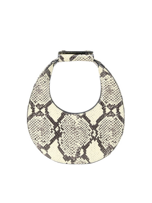 Goodnight Moon Bag in White Snake by Staud showcased in a stylish setting with a detachable shoulder strap.