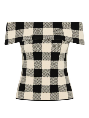 Pippa Strapless Top in Heritage Plaid featuring a vintage-inspired plaid pattern and flattering off-shoulder design.