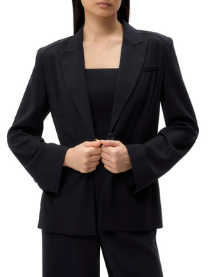 Boy Blazer in Midnight showcasing its stylish oversized design and one-button closure.