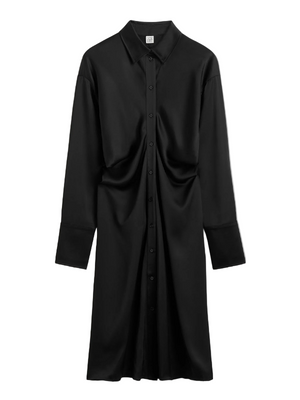 Slouch Shirtdress in Black by TOTEME displayed on a model highlighting its modern silhouette and refined crepe-back satin material.
