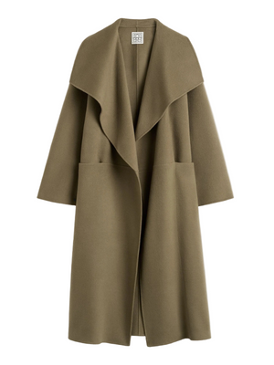 TOTEME Signature Doublé Coat in Hazel showcasing its oversized silhouette and luxurious wool-cashmere fabric.