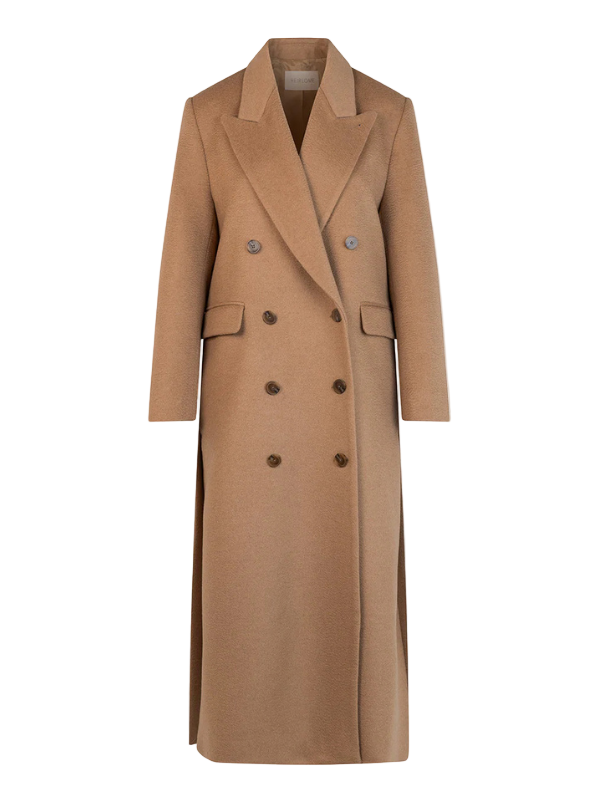 Lilli Coat in Camel displayed on a model showing the double breasted design and peak lapel.