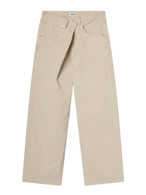 Agolde Vana Fold Corduroy in Rice Grass showcasing the signature fold-over waistband and relaxed fit.
