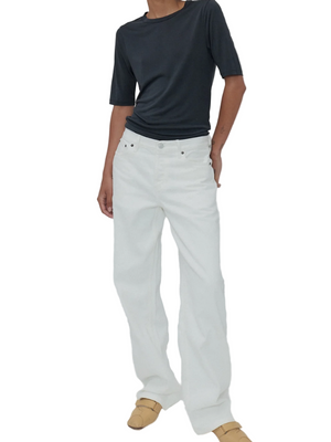 Everyday Jean in Milk by Still Here, showcasing the relaxed mid-rise fit and traditional button fly.