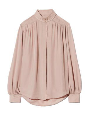 Revi Blouse in Nude by Nili Lotan featuring a relaxed fit, collar stand with tropunto topstitching, and billowy sleeves.