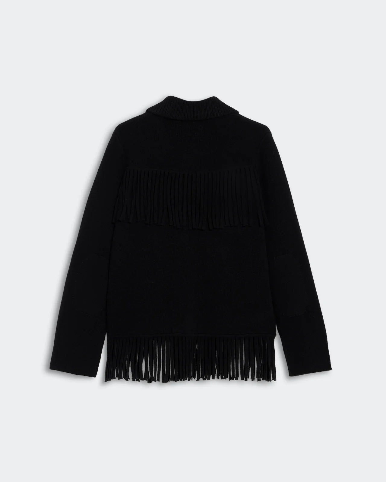 Casual styling of the Western Fringe Jacket in Black, ideal for adding a fashionable edge to your outfit.