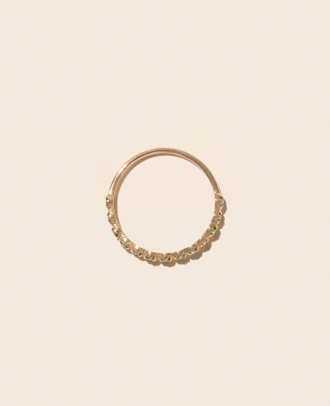 Stacked Ava No2 Rings in Emerald by Pascale Monvoisin, beautifully highlighting different shades of emeralds.