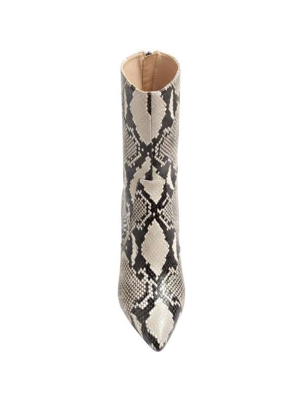 Lifestyle image of the Elsa Zipped Ankle Boot in Printed Python worn in a fashionable outfit, perfect for any casual occasion.