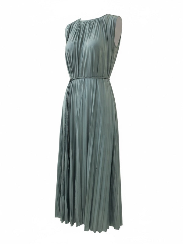 A close-up of the Fianna Dress in Sea Glass showcasing its smooth plissé satin fabric and stylish design details.