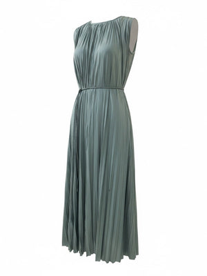 A close-up of the Fianna Dress in Sea Glass showcasing its smooth plissé satin fabric and stylish design details.