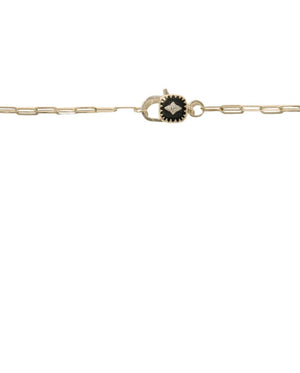 Close-up of the Ginger Necklace in Black, featuring 9 carats yellow and white gold along with diamond accents.