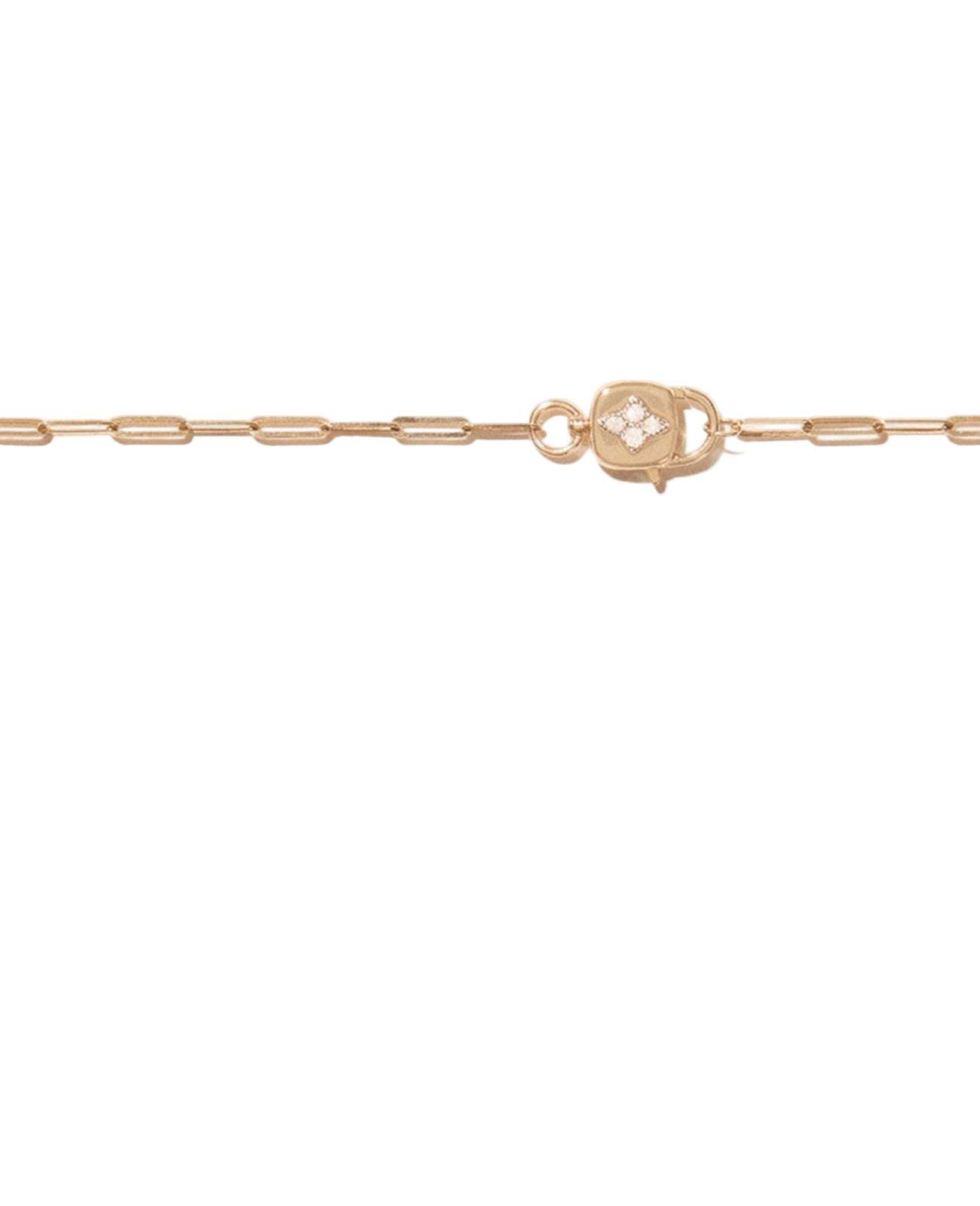 Close-up of the luxurious Louise Short Necklace in Gold showcasing its 9 carats yellow and white gold materials.