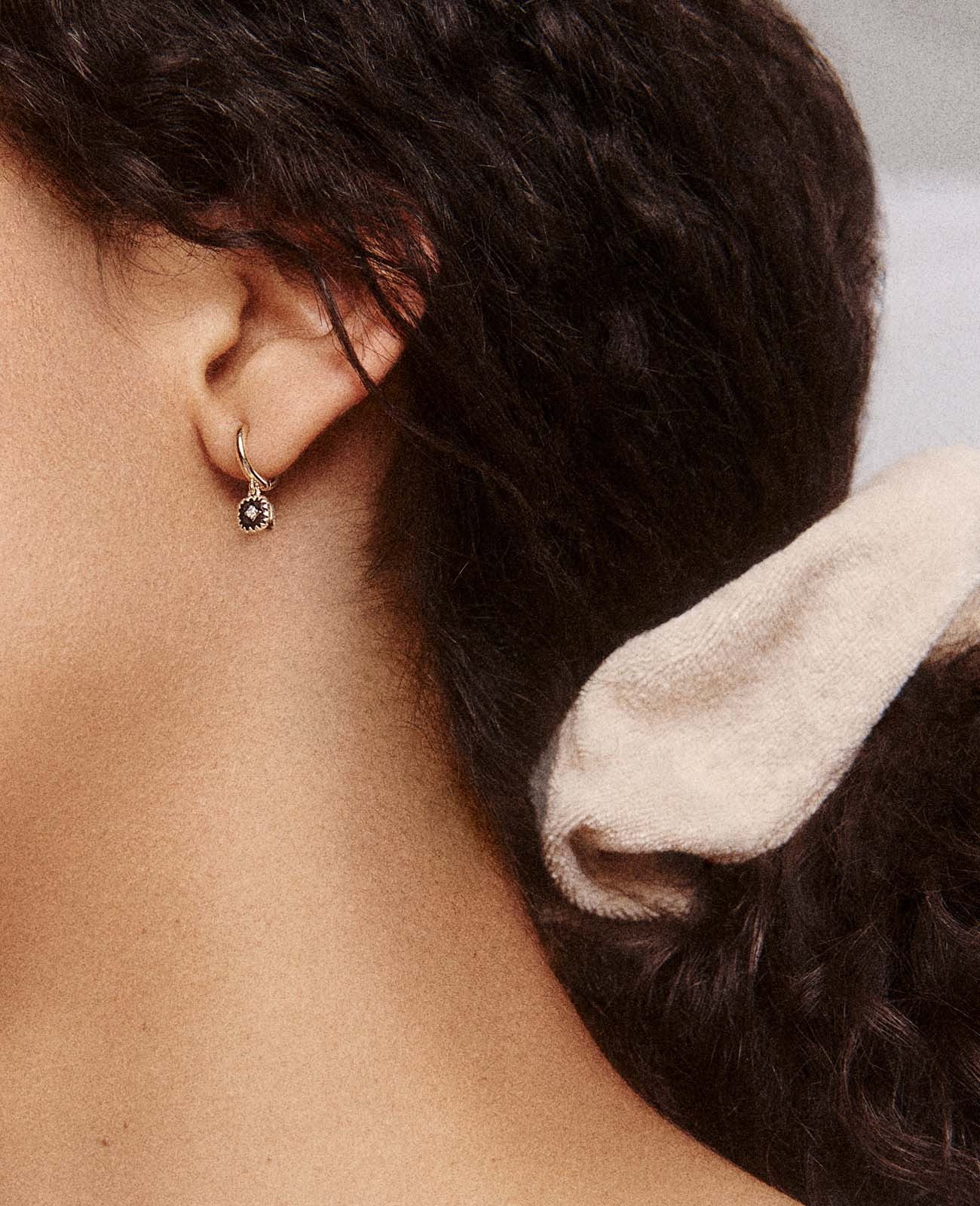 Stylish Pierrot Hoops in Black earrings displayed on a white background, perfect for adding elegance to any outfit.