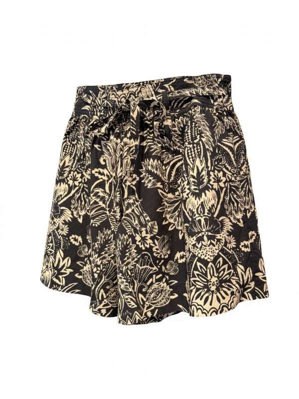 Close-up of Ulla Johnson Rowan Belted Short in Noir Flora, showcasing the tie waist and intricate batik textures.