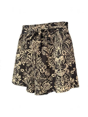 Close-up of Ulla Johnson Rowan Belted Short in Noir Flora, showcasing the tie waist and intricate batik textures.