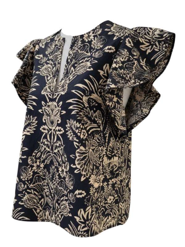 Close-up of the Severine Flutter Sleeve Top in Noir Flora by Ulla Johnson showing the detailed batik texture and loose fit.