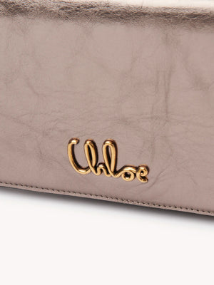 Iconic Flap Wallet on Chain in Shiny Grey Metallized Leather