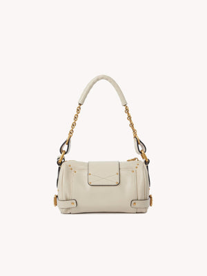 The Small Paddington Chain Bag in Cloudy Cream with chain and leather strap.